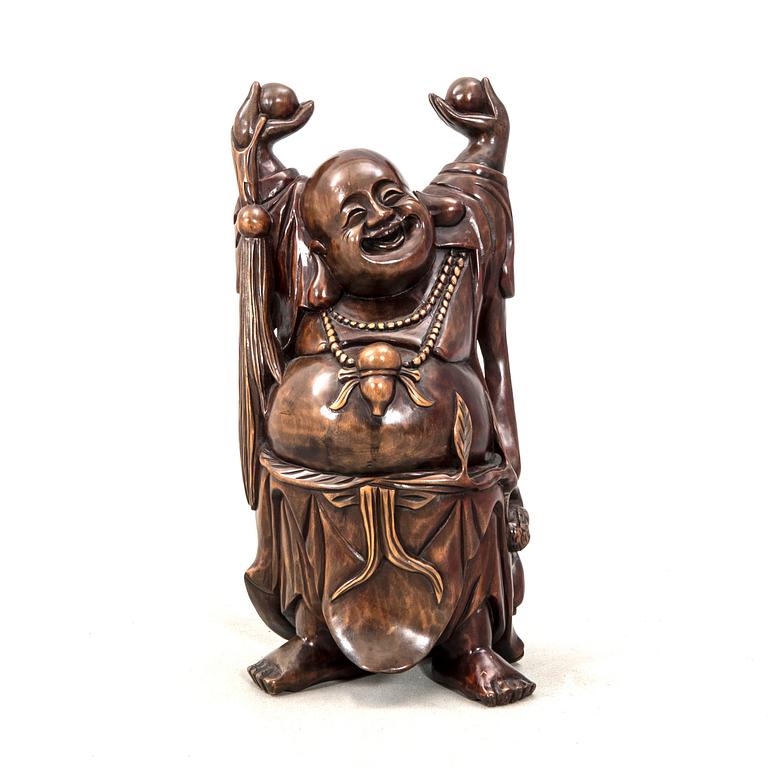 A wooden standing Buddha 20th century.