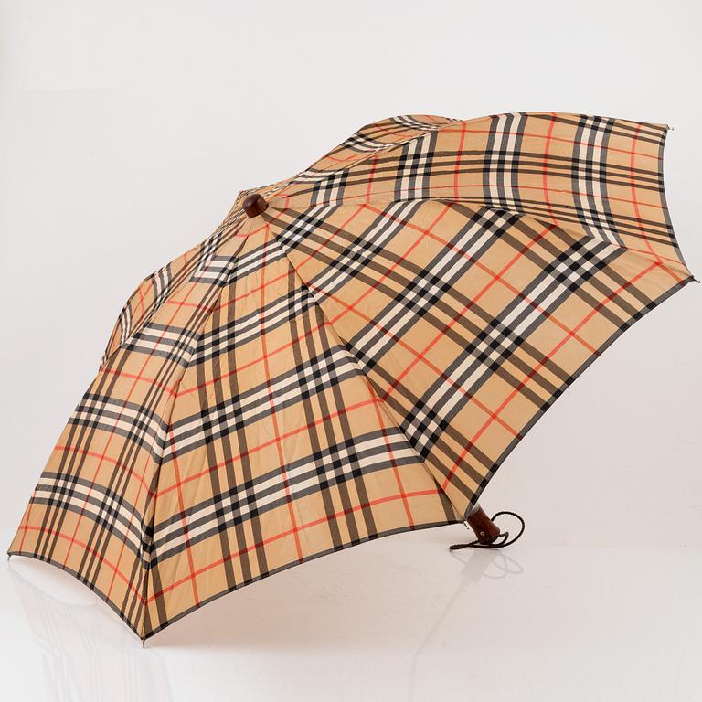 Burberry, a Nova Check tote bag and umbrella.