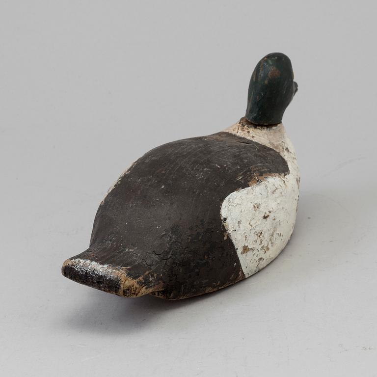A duck hunt wood decoy circa 1900.