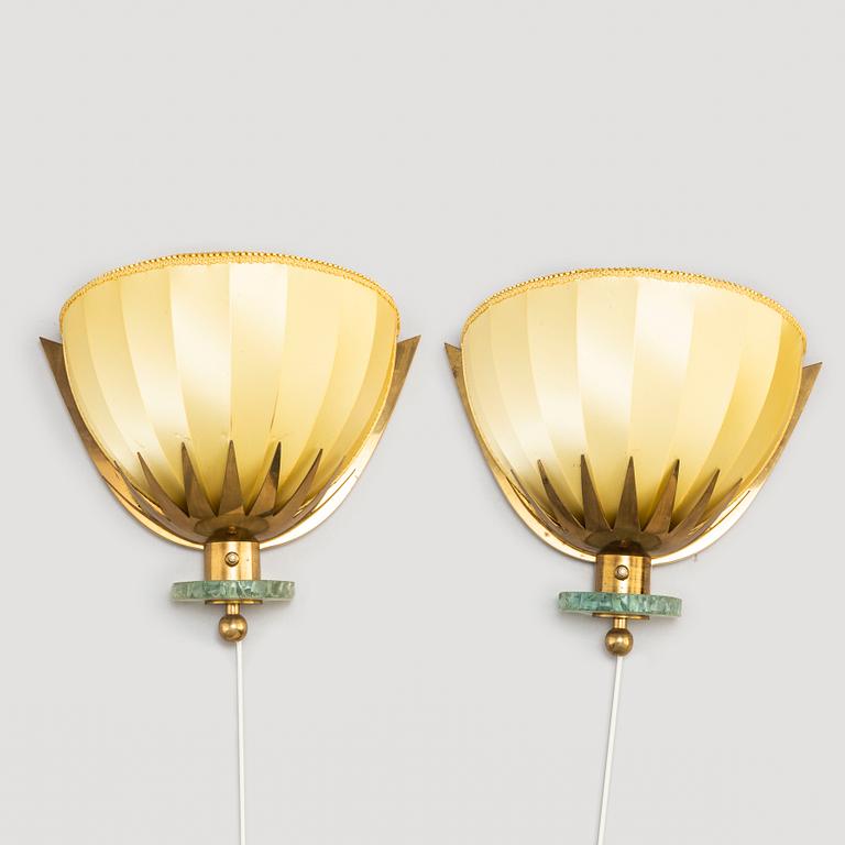 A pair of Swedish Modern brass wall lights, 1940's.