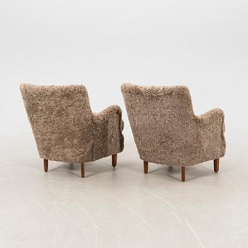 Armchairs, a pair from the 1940s.