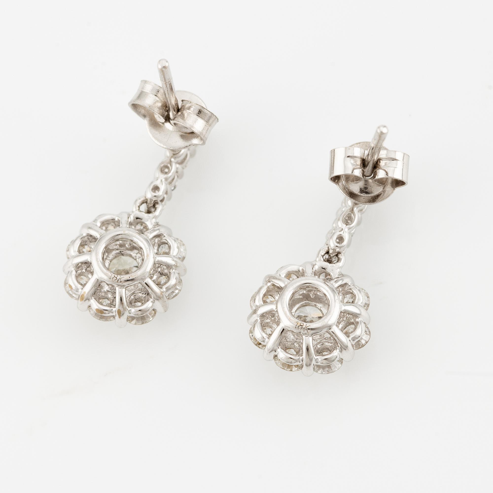 Earrings, a pair, 18K white gold with brilliant-cut diamonds.