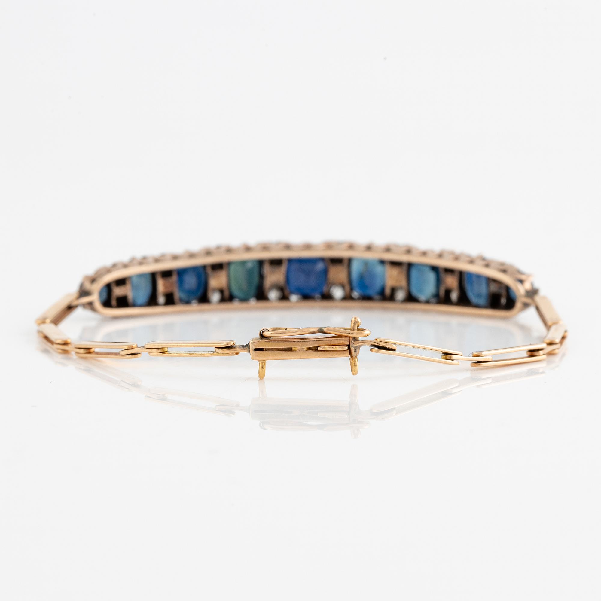 Bracelet 14K gold with dark sapphires and old-cut diamonds.