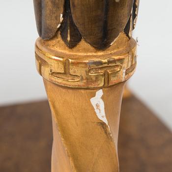 An early 20th century mirror with console table in late Gustavian style.