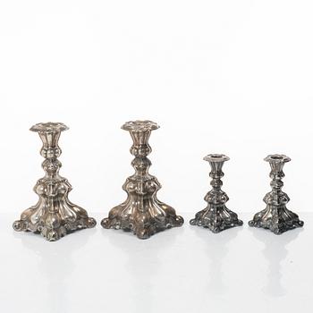 Four Baroque style silver candlesticks, 20th century.