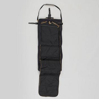 a CHANEL garment bag.