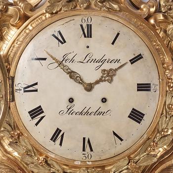 A rococo giltwood cartel clock by J. Lindgren (master in Stockholm 1761-62).