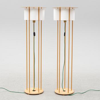 Torbjörn Ahlström, a pair of birch floor lights, dated 1993.