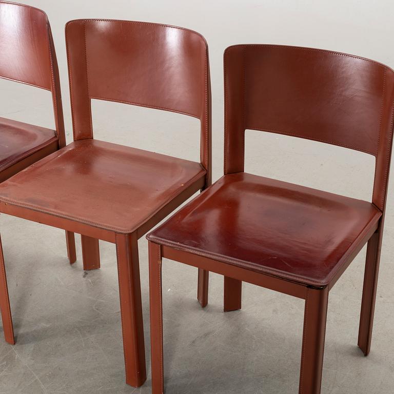 MATTEO GRASSI, a set of four leather chairs.