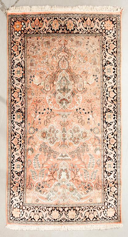 Kashmir silk rug, approximately 223x125 cm.