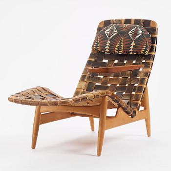 Arne Vodder, a woven leather lounge chair with attached side table, Bovirke, Denmark, 1950s.