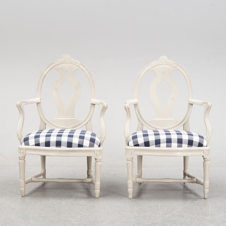 A pair of gustavian armchairs made in Stockholm, the later part of the 18th century.