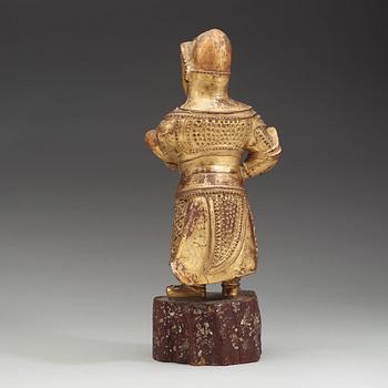 A wood sculpture of a guardian figure, (1644-1912).