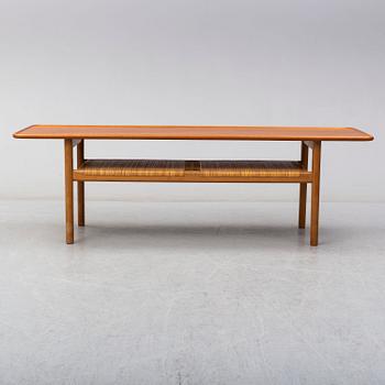 HANS J WEGNER, a teak and oak coffee table from Andreas Tuck, Denmark.