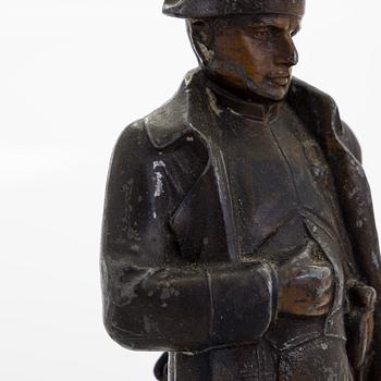 A 20th century patinated white metal sculpture.