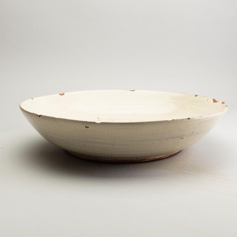 A large cream ware dish, South East Asia, 18th/19th Century.