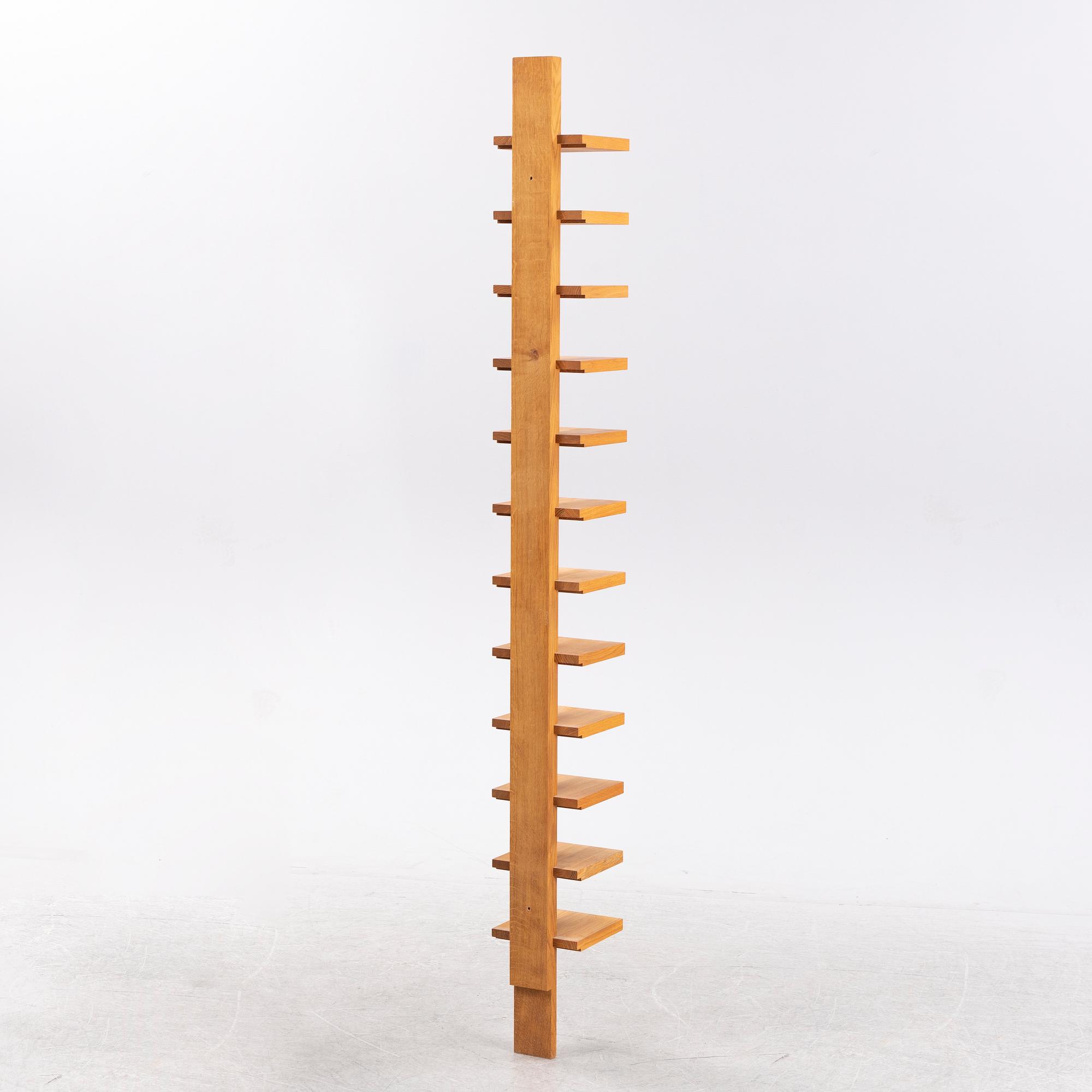 A 'Pilaster' shelf by John Kandell for Källemo, designed 1989.