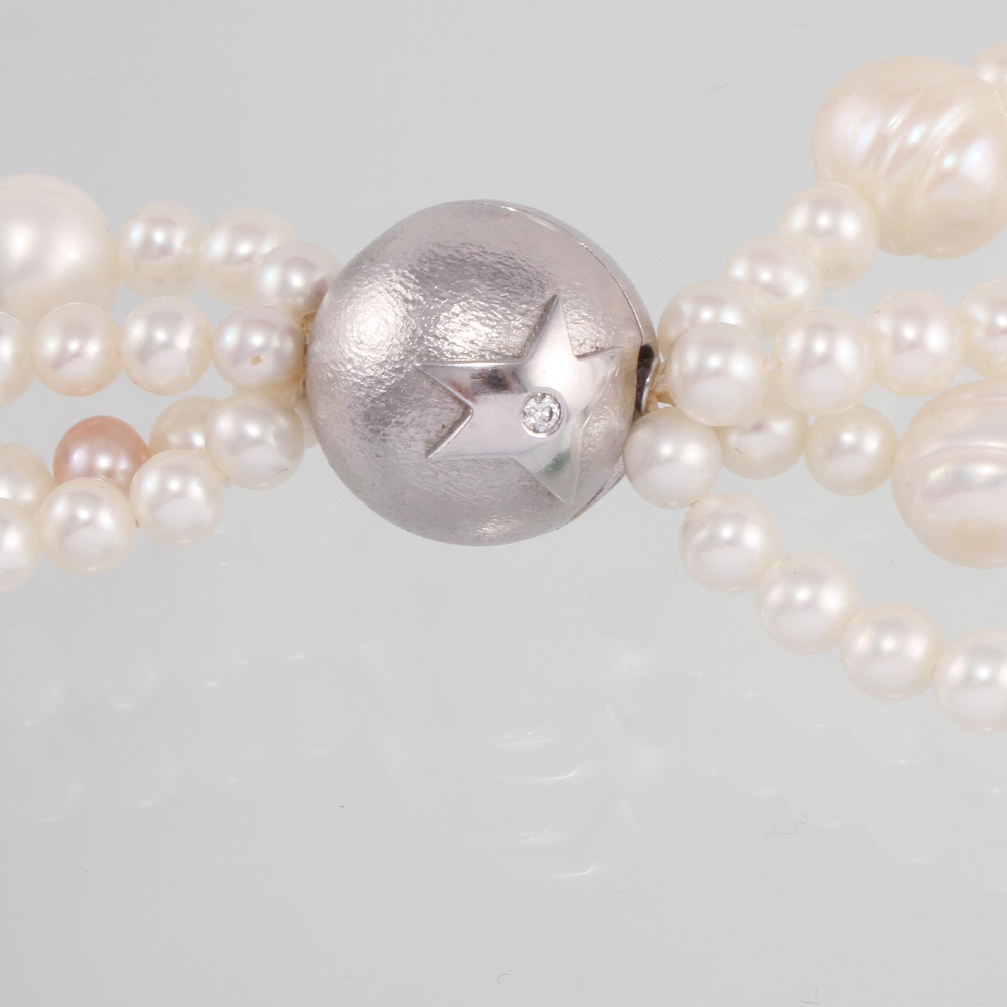 COLLIER, odlade pärlor med lås i 18K vitguld, briljantslipade diamanter samt odlad pärla, Ole Lynggaard.