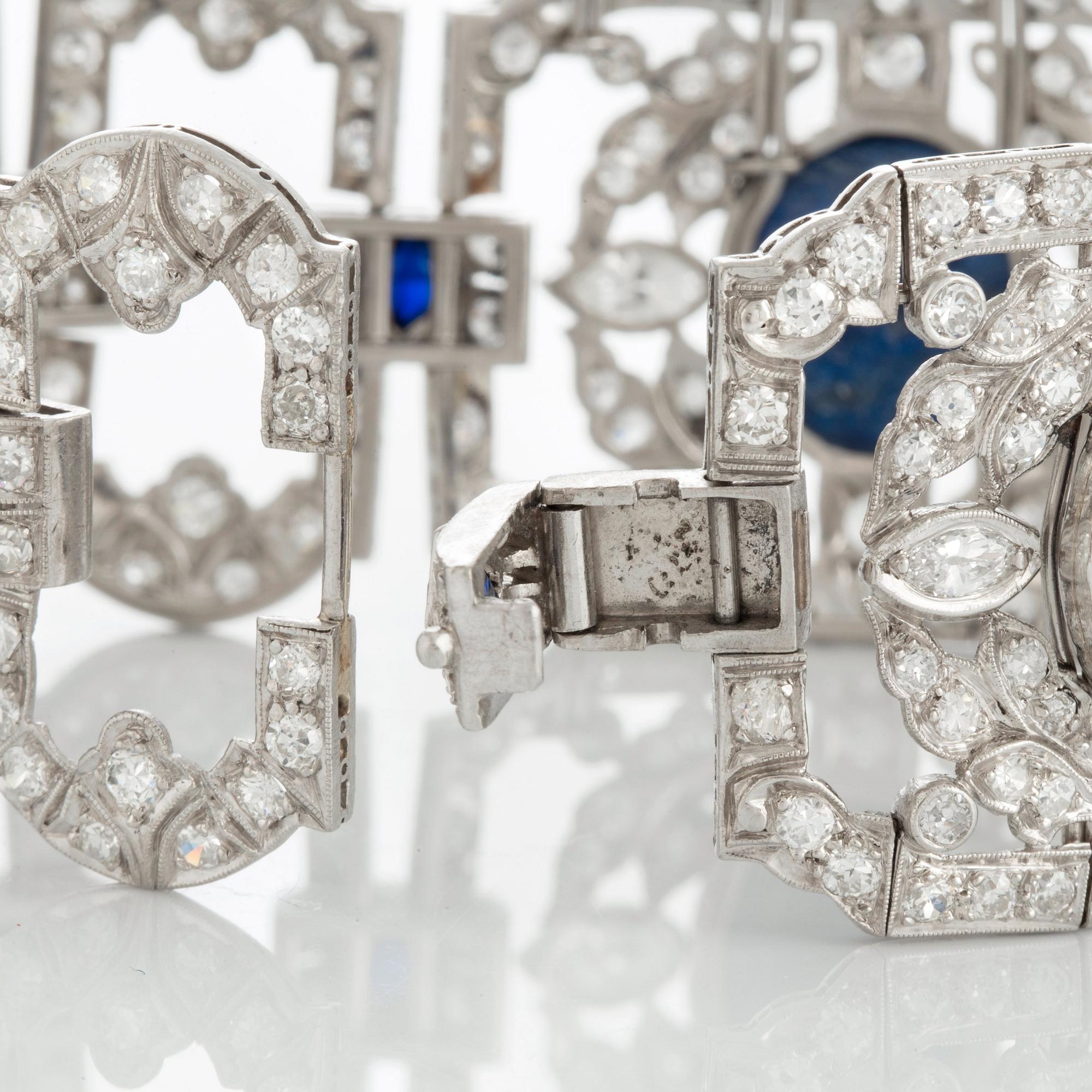 A platinum bracelet set with lapis lazuli, old-cut diamonds with a total weight of ca 10 cts and synthetic sapphires.