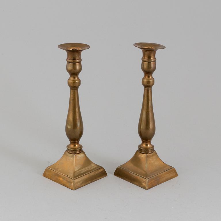 A PAIR OF BRONZE CANDLESTICKS, 19th century.