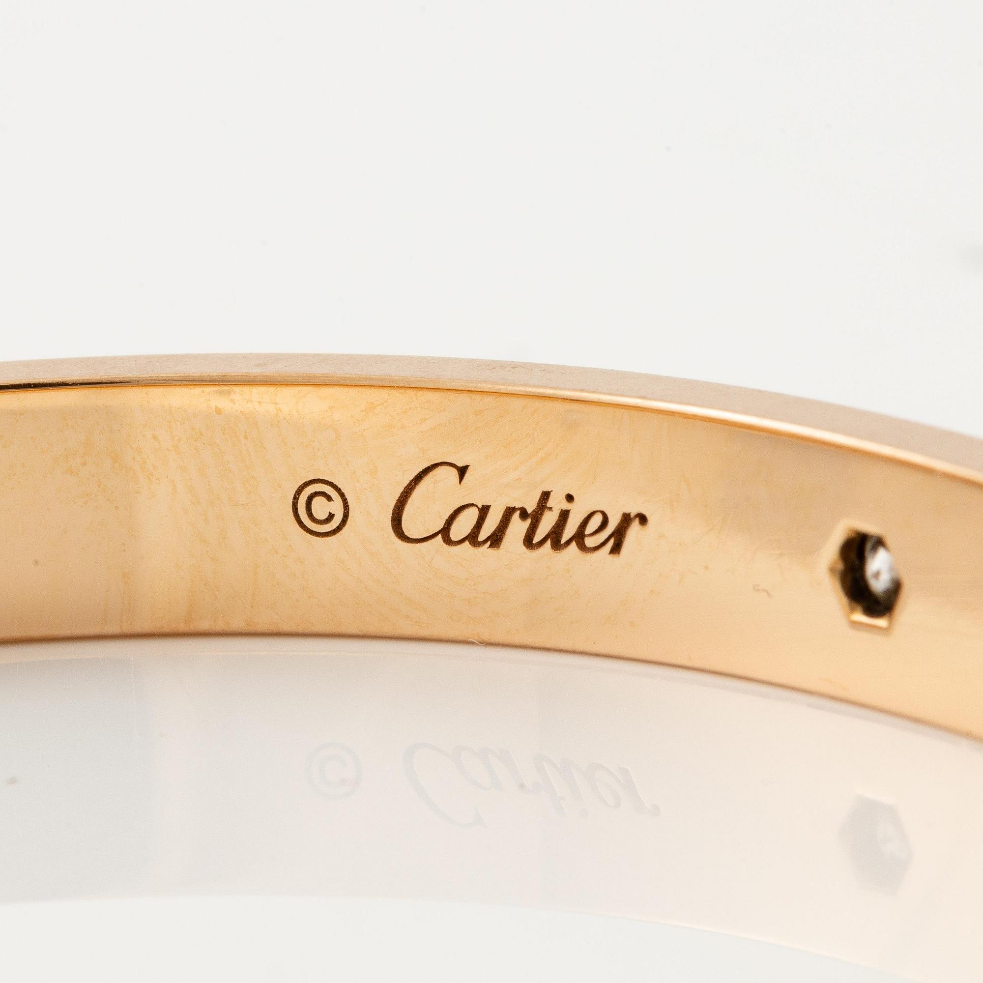 A Cartier "Love" bracelet in 18K rose gold with round brilliant-cut diamonds.