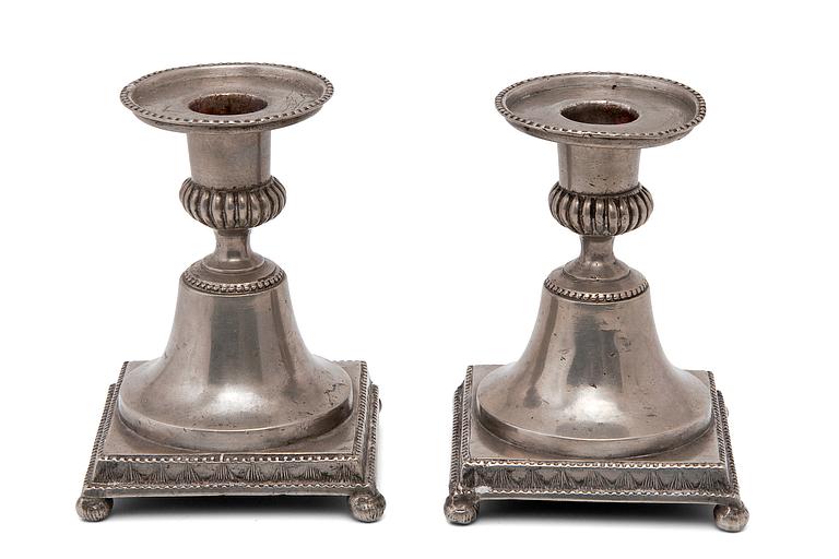 A PAIR OF CANDLESTICKS.