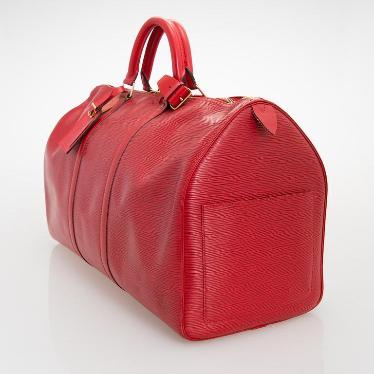 Louis Vuitton, A Red Epi Leather Keepall travel bag.
