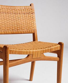 Hans J. Wegner, a set of 10 oak and rattan 'CH31' chairs, Carl Hansen & Son, Denmark 1950s.