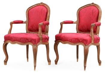 474. A pair of Rococo 18th century armchairs.
