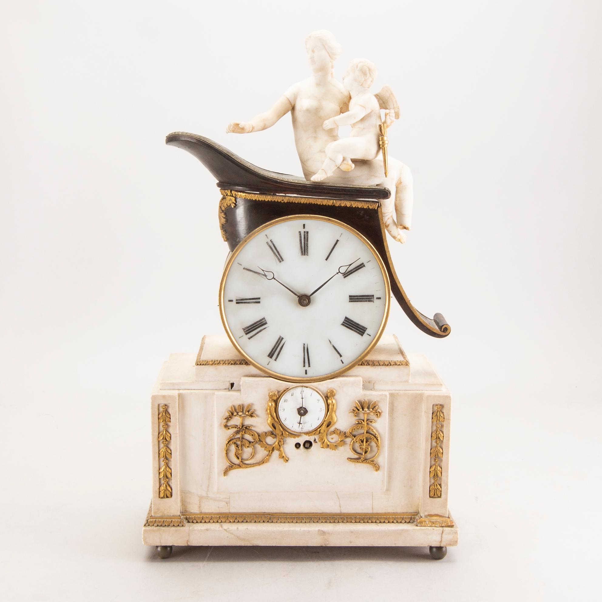 An Empire table clock first half of the 19th century.