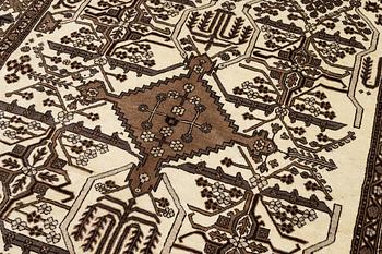 A Ferdos carpet, c. 295 x 210 cm.