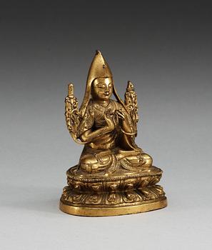 A gilt-bronze seated figure of a Lama, presumably Second Khalka Jetsun Dampa, Mongolia, presumably 18th Century.