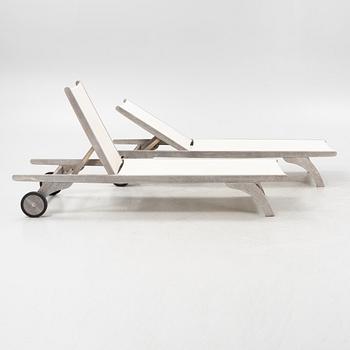 A pair of 'Columbus Sunbed' teak deck chairs, Skagerak, Denmark.