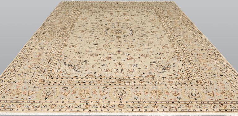 A Keshan carpet, c. 343 x 246 cm.