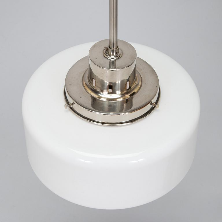 Paavo Tynell, kattovalaisin, malli 2004, Taito 1930-luku.