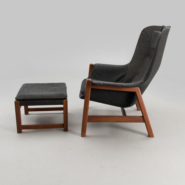 A 1960s 'Caravelle' armchair and ottoman for Puunveisto Oy - Träsnideri Ab, Finland.