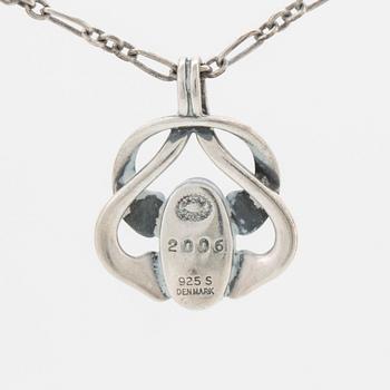 A silver and moonstone jewellery set consisting of necklace and earrings by Georg Jensen, jewellery of the year 2006.
