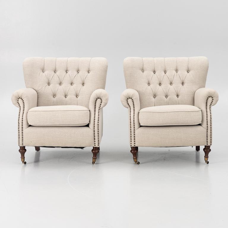 A pair of armchairs, early 21st century.