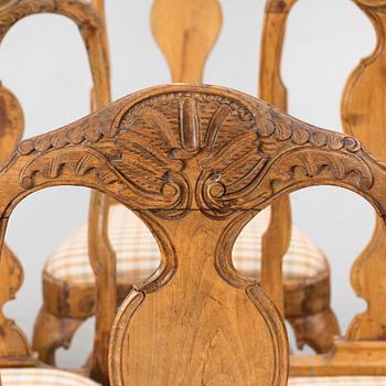 An assembled suite of ten rococo chairs, Western Sweden, later part 18th century.