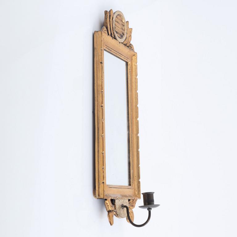 A pair of Gustavian style mirror sconces, early 20th Century.