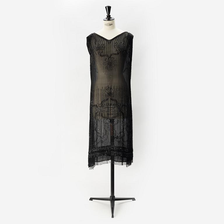 A 1920's pearl embroidered dress.