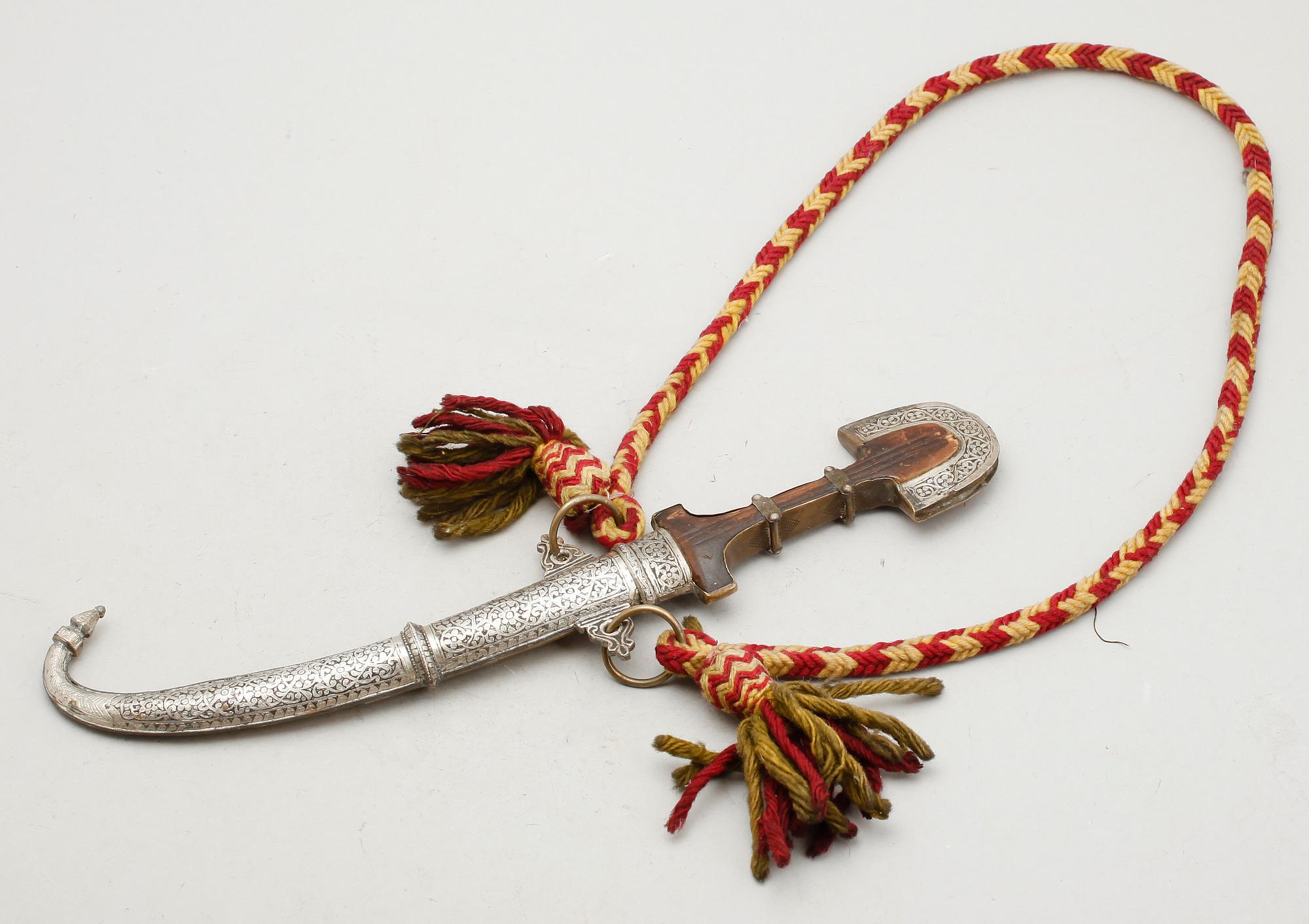 DOLK, orientalisk, metall och mässing.