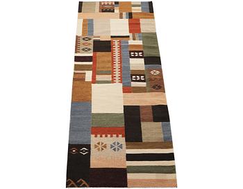 A runner carpet, Kilim, c. 297 x 84 cm.