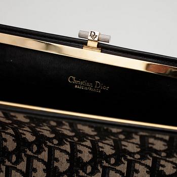 CHRISTIAN DIOR, a monogram canvas evening bag.