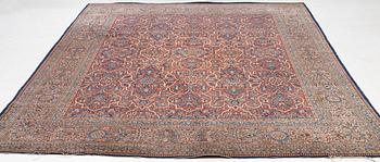 An oriental carpet, c. 425 x 305 cm.