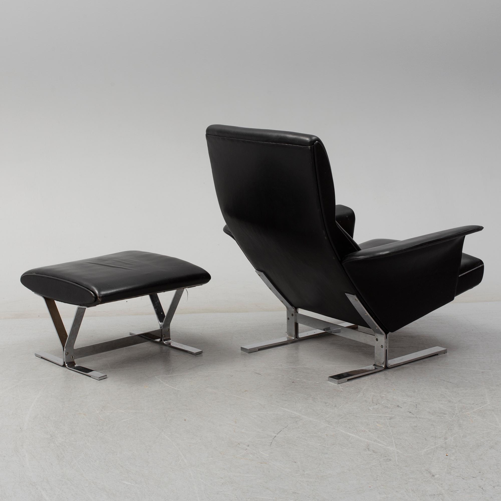 A second half of the 20th century easy chair and stool by Georg Thams, Vejens Polstermöbelfabrik, Denmark.