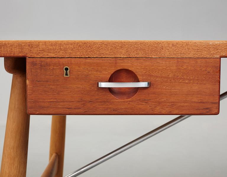 Hans J. Wegner, A Hans J. Wegner teak and oak 'JH 571' desk executed by Johannes Hansen, Denmark 1950-60's.