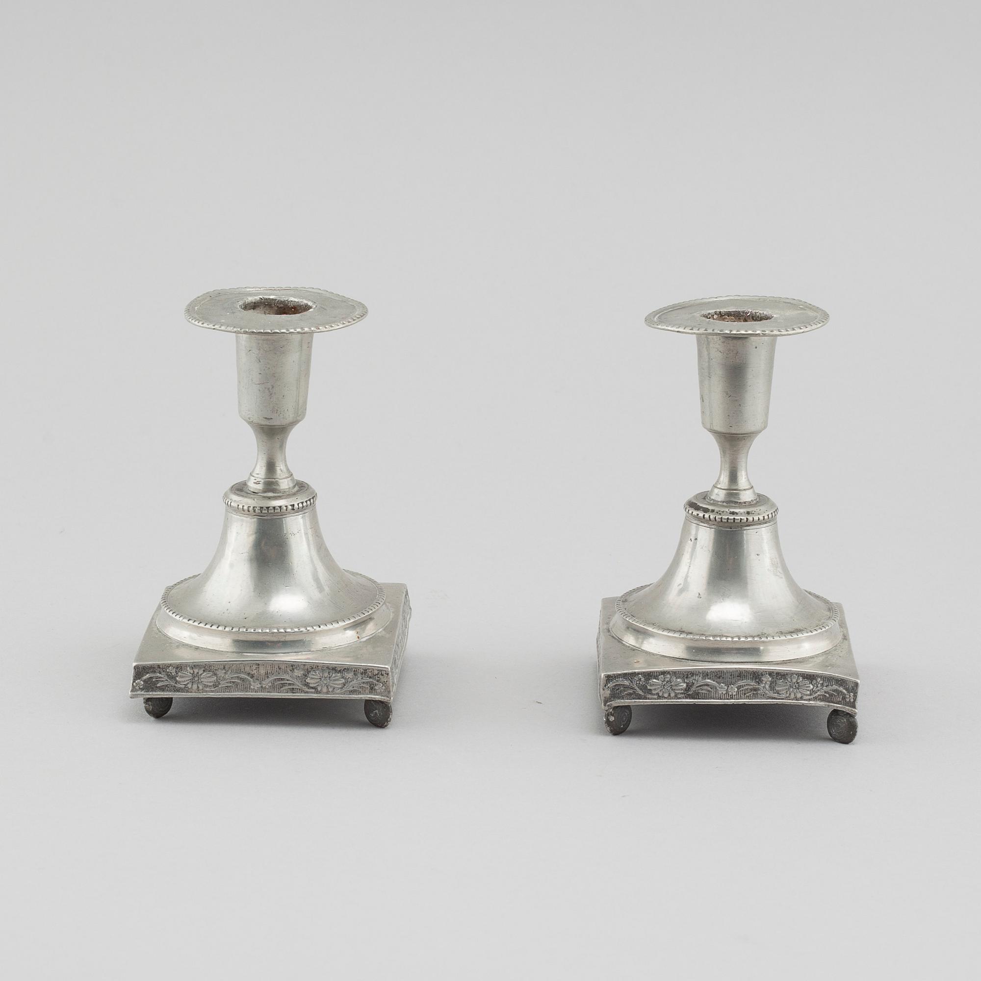A pair of pewter candlesticks, probably by Gustaf Frederic Wigholm in Eskilstuna, first half of the 19th century.