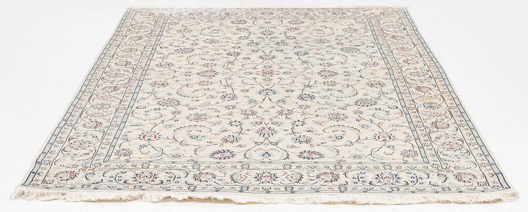 Rug, Nain, part silk, latter part of the 20th century, 293 x 198 cm.