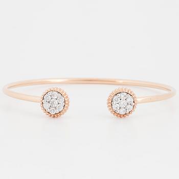 An 18K rose gold bracelet set with round brilliant-cut diamonds.